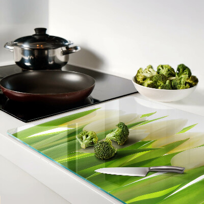 Chopping board Tulips against a background of green leaves