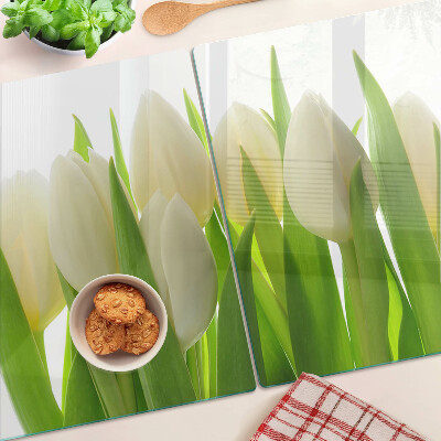 Chopping board Tulips against a background of green leaves
