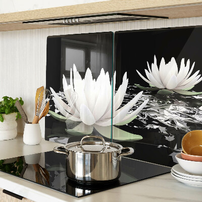 Glass chopping board Water lilies on a black background