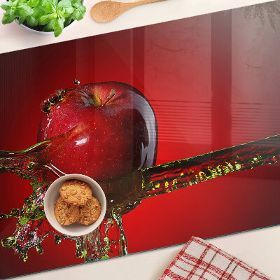 Chopping board glass Red apple with water