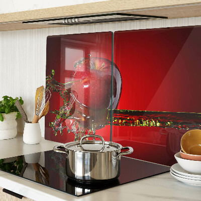 Chopping board glass Red apple with water