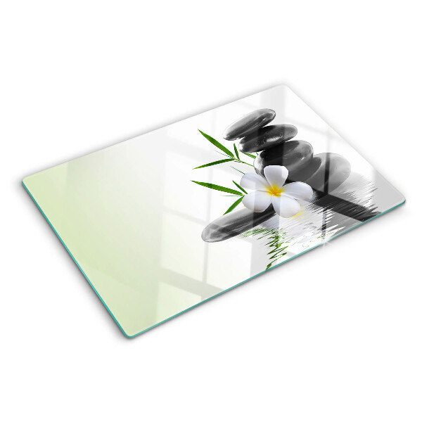 Cutting board Flowers and stones on the water