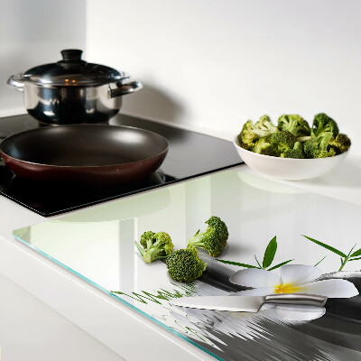Cutting board Flowers and stones on the water