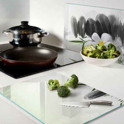 Cutting board Flowers and stones on the water