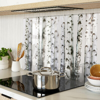 Glass chopping board White birches in the forest