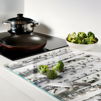 Glass chopping board White birches in the forest