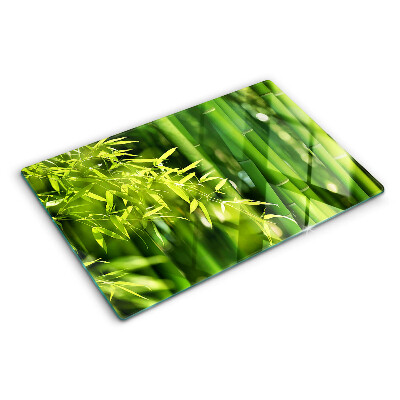 Chopping board Bamboo leaves and green foliage
