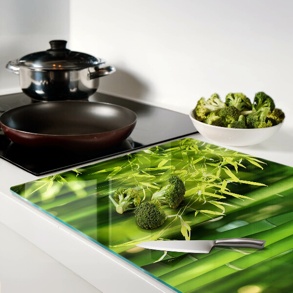 Chopping board Bamboo leaves and green foliage