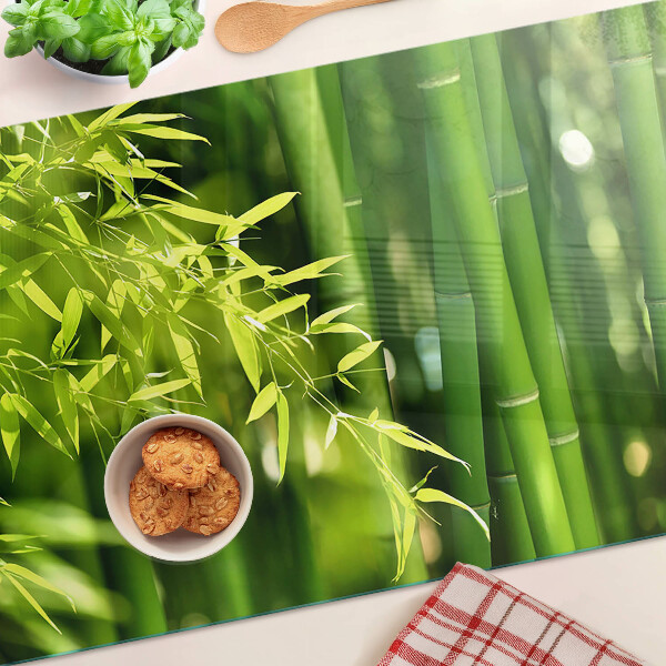 Chopping board Bamboo leaves and green foliage