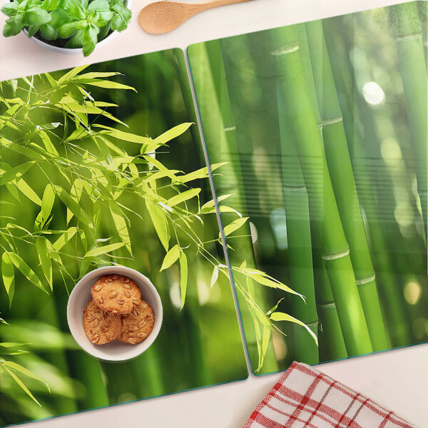 Chopping board Bamboo leaves and green foliage