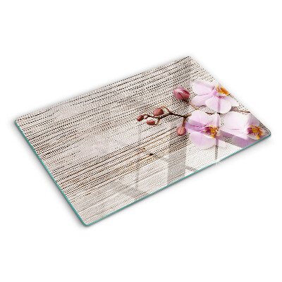 Cutting board Orchids on a wood background