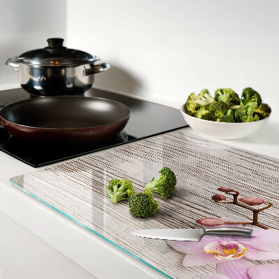 Cutting board Orchids on a wood background