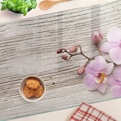 Cutting board Orchids on a wood background