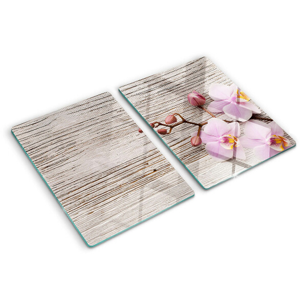 Cutting board Orchids on a wood background