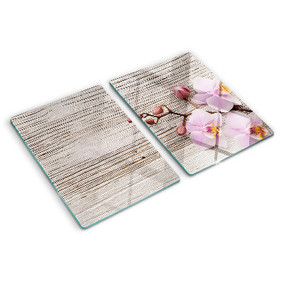 Cutting board Orchids on a wood background