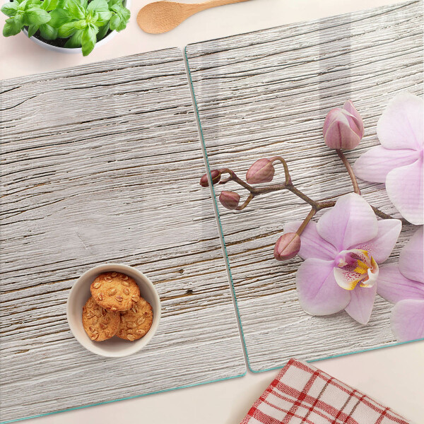 Cutting board Orchids on a wood background