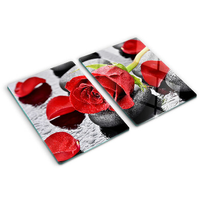 Glass cutting board Rose on stones with water drops