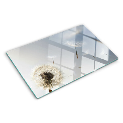 Cutting board Dandelions in the background of the window