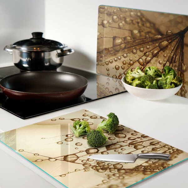 Glass kitchen board Water drops on a plant