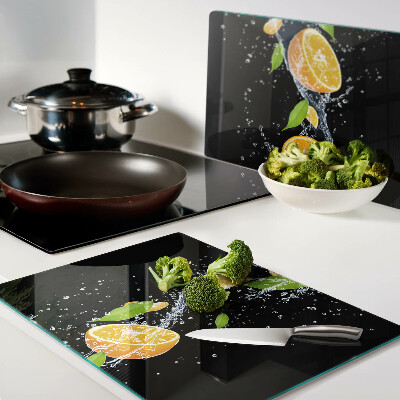 Glass kitchen board Citrus fruits in water