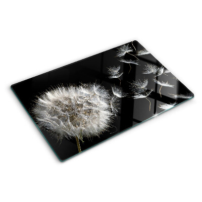 Glass chopping board Dandelions on a black background