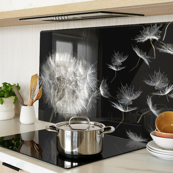 Glass chopping board Dandelions on a black background