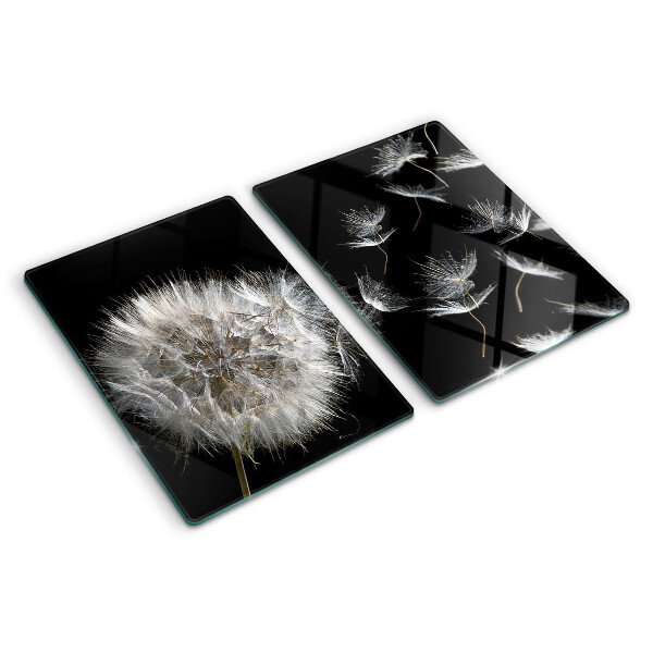 Glass chopping board Dandelions on a black background