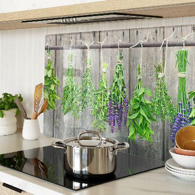 Cutting board Dried herbs on a wooden background