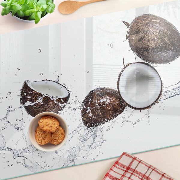 Glass kitchen board Coconuts in water