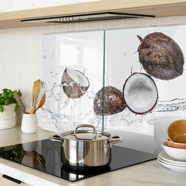Glass kitchen board Coconuts in water