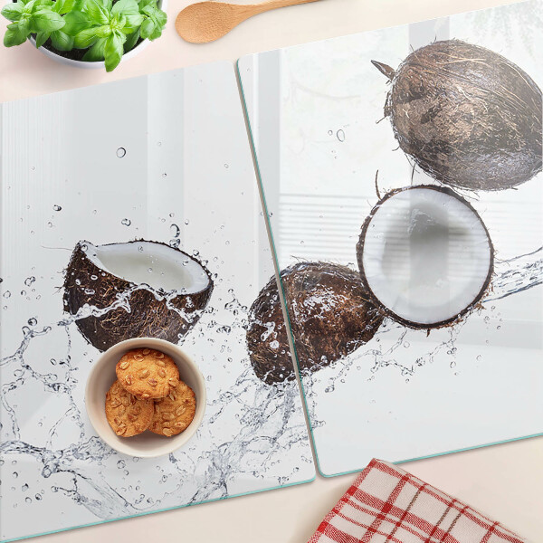 Glass kitchen board Coconuts in water