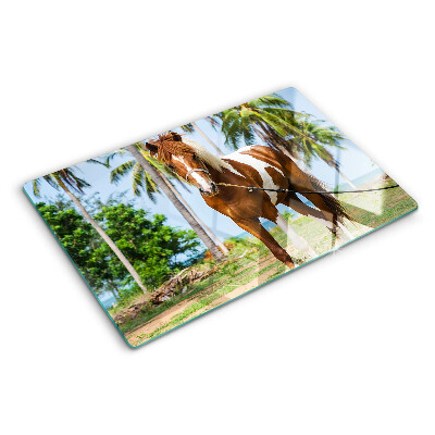 Chopping board A horse with palm trees in the background
