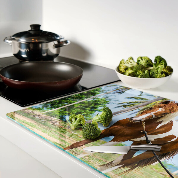 Chopping board A horse with palm trees in the background