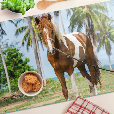 Chopping board A horse with palm trees in the background