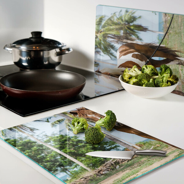 Chopping board A horse with palm trees in the background