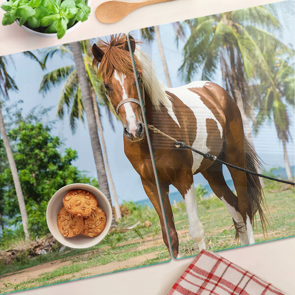Chopping board A horse with palm trees in the background