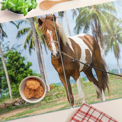 Chopping board A horse with palm trees in the background