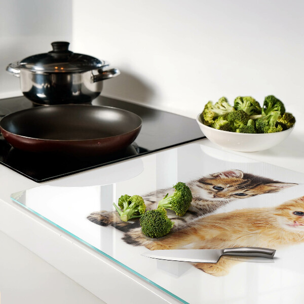 Glass chopping board Cats on a white background