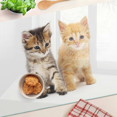Glass chopping board Cats on a white background