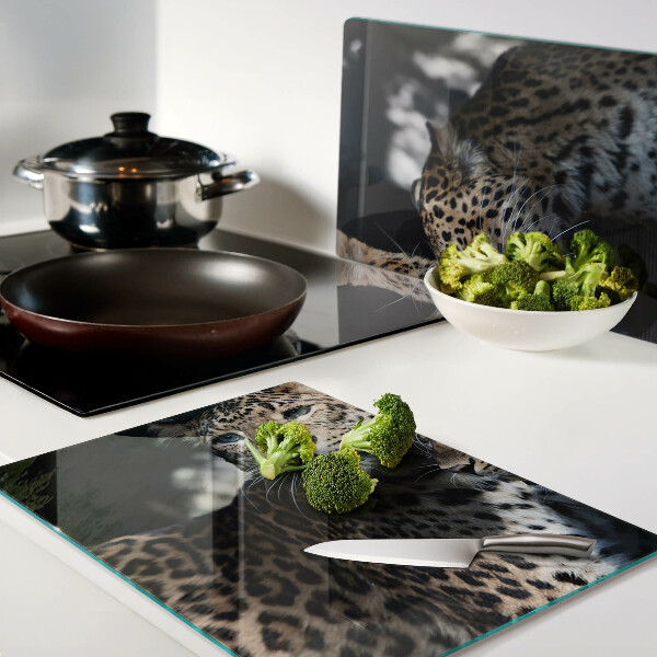 Glass chopping board Cheetahs on a dark background