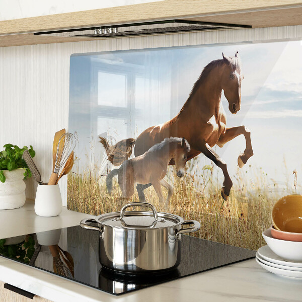 Glass chopping board Horses in a meadow in the sun