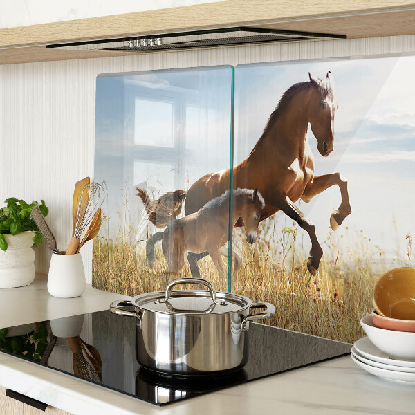 Glass chopping board Horses in a meadow in the sun