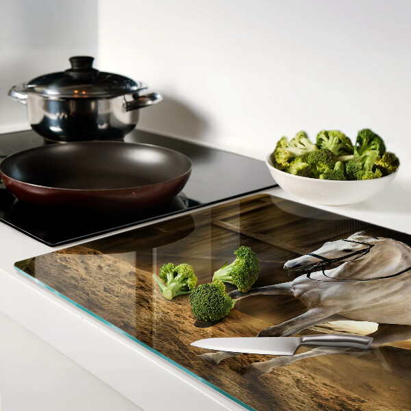 Chopping board glass A horse in motion in the stable