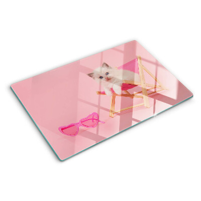 Cutting board A kitten on a deckchair on a pink background