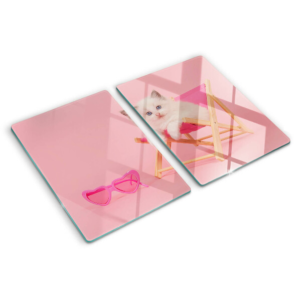Cutting board A kitten on a deckchair on a pink background