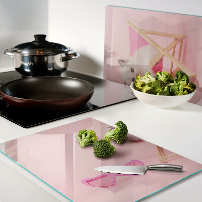 Cutting board A kitten on a deckchair on a pink background
