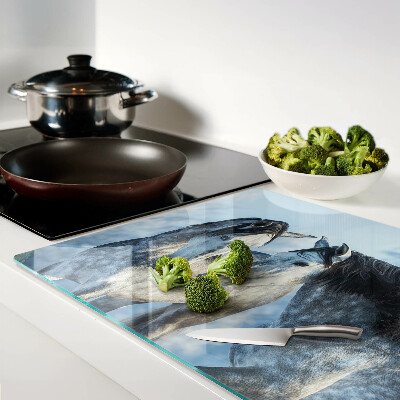 Glass chopping board Horses in a winter landscape