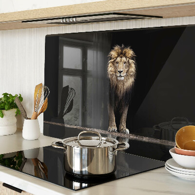 Glass kitchen board Lion on a dark background