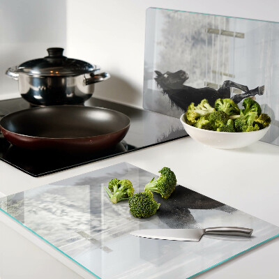 Chopping board A horse in a winter landscape