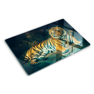Glass cutting board A tiger lying on the rocks
